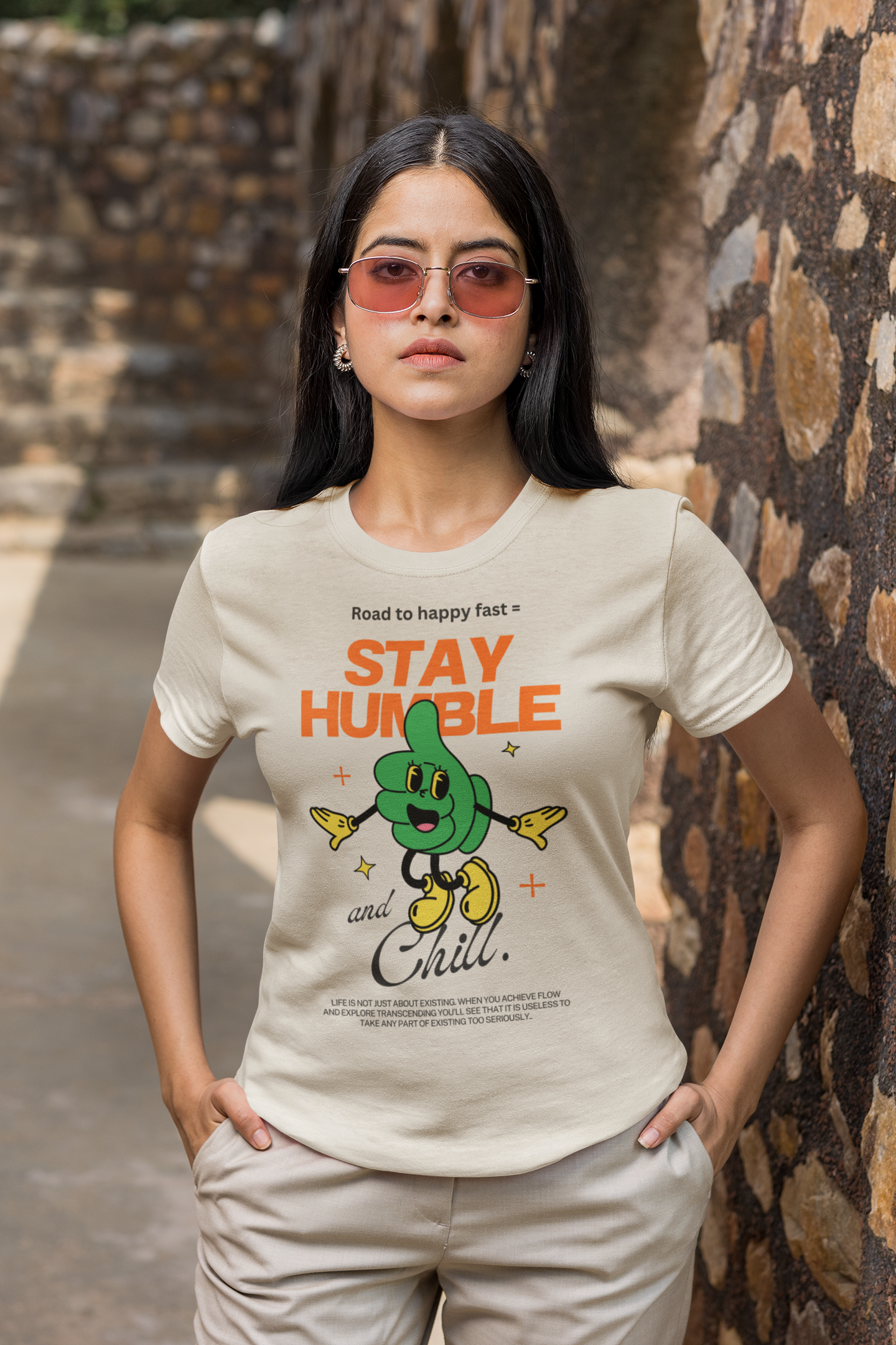 Woman wearing a t-shirt with 'Stay Humble and Chill' design outdoors. Xlr8happy brand, sold by Hapilumi. Part of the how to be happy collection.